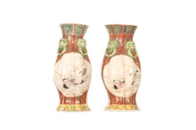 Lot 625 - A PAIR OF FAMILLE ROSE WALL VASES.