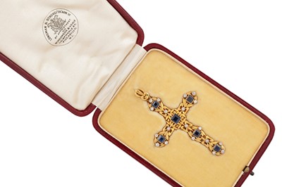 Lot 161 - A sapphire and diamond cross pendant, circa 1910