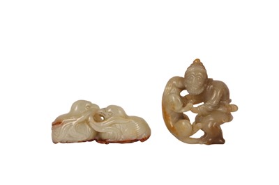 Lot 519 - TWO CHINESE PALE CELADON JADE CARVINGS.