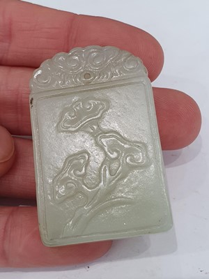 Lot 68 - TWO CHINESE PALE CELADON JADE PLAQUES, AN ARCHER'S RING AND A SEAL.