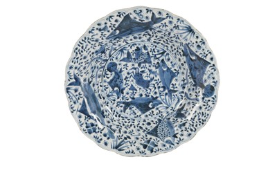 Lot 445 - A CHINESE BLUE AND WHITE DISH, IN THE MING TASTE, KANGXI