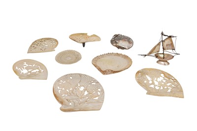 Lot 158 - A COLLECTION OF NINE VARIOUS CARVED  OYSTER / PEARL SHELLS OF VARIOUS DESIGN