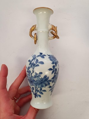 Lot 107 - A NEAR-PAIR OF CHINESE BLUE AND WHITE VASES.