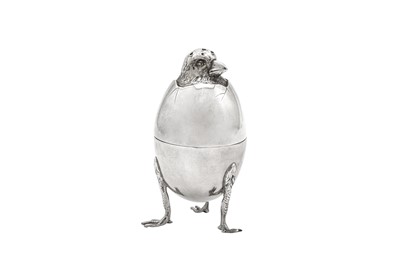 Lot 95 - An early 20th century French 950 standard silver novelty egg cup and cruet, Paris circa 1900 by Emile Francois