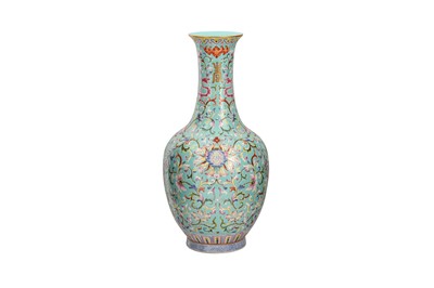 Lot 662 - A CHINESE FAMILLE ROSE TURQUOISE-GROUND BOTTLE VASE.