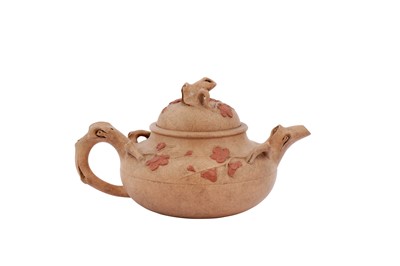 Lot 616 - A CHINESE YIXING ZISHA 'PRUNUS' TEAPOT AND COVER.
