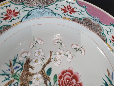 Lot 597 - A PAIR OF LARGE CHINESE FAMILLE ROSE 'FLOWERS' CHARGERS.