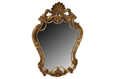 Lot 325 - A BAROQUE STYLE GILT FRAMED CARTOUCHE FORM MIRROR, LATE 20TH CENTURY
