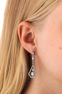 Lot 11 - A pair of diamond pendent earrings