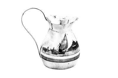 Lot 359 - An early 20th century Iraqi silver and niello milk jug, circa 1930 signed Omara Amir