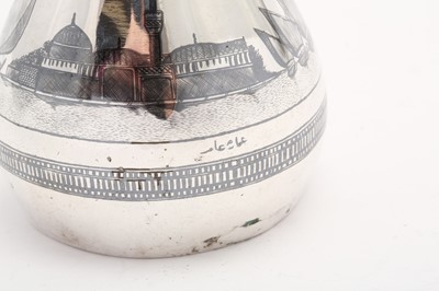 Lot 359 - An early 20th century Iraqi silver and niello milk jug, circa 1930 signed Omara Amir