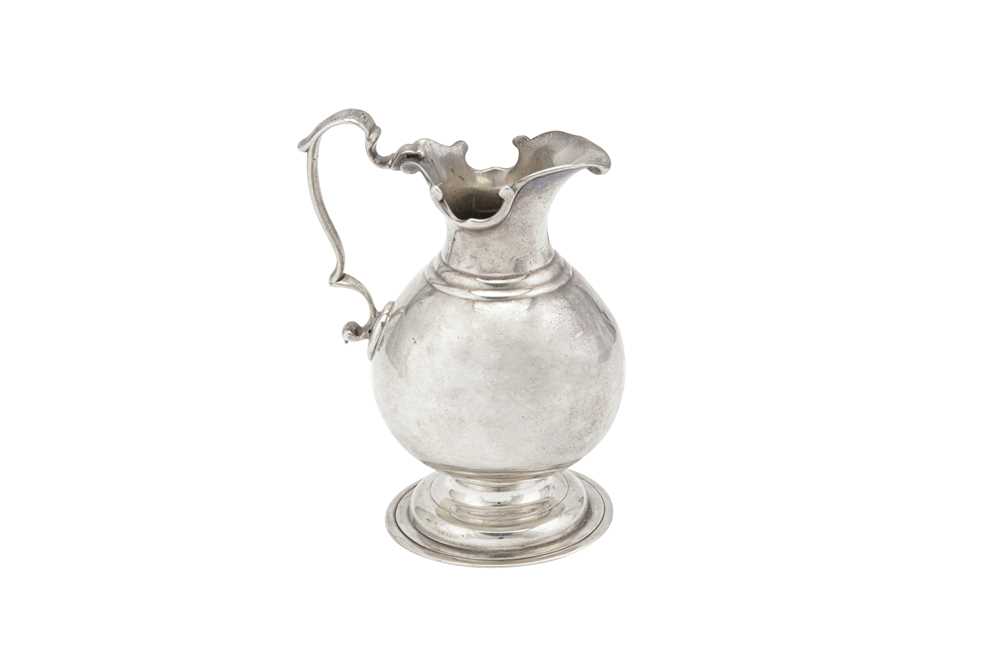 Lot 301 - AN 18TH CENTURY PROVINCIAL SILVER CASTER CONVERTED TO A CREAM JUG, CANCELLED NEWCASTLE MARKS