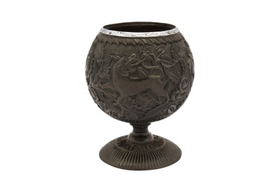 Lot 131 - A 19th century unmarked Sheffield Plate mounted coconut cup, probably Indian Colonial circa 1850