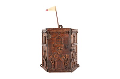 Lot 186 - A CARVED WOOD BOX MODELLED AS A TOWER