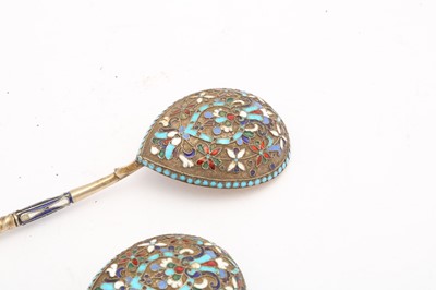 Lot 399 - A pair of Nicholas II Russian 84 zolotnik silver gilt and cloisonné enamel spoons, Moscow 1908-14 by Nikolai Nikolaievich Zverev (active 1908-14)