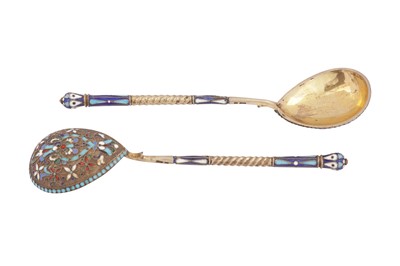 Lot 399 - A pair of Nicholas II Russian 84 zolotnik silver gilt and cloisonné enamel spoons, Moscow 1908-14 by Nikolai Nikolaievich Zverev (active 1908-14)