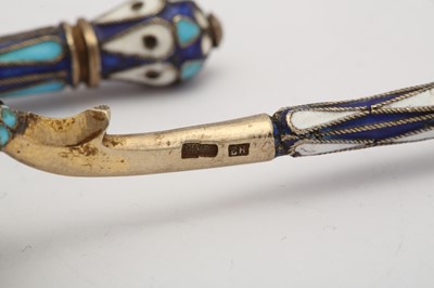 Lot 399 - A pair of Nicholas II Russian 84 zolotnik silver gilt and cloisonné enamel spoons, Moscow 1908-14 by Nikolai Nikolaievich Zverev (active 1908-14)