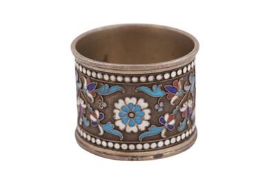 Lot 397 - A Nicholas II Russian 84 zolotnik silver gilt and cloisonné enamel napkin ring, Moscow 1898-1908, makers mark obscured