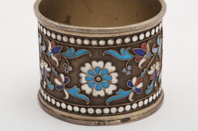 Lot 397 - A Nicholas II Russian 84 zolotnik silver gilt and cloisonné enamel napkin ring, Moscow 1898-1908, makers mark obscured