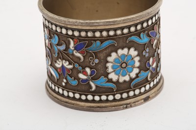 Lot 397 - A Nicholas II Russian 84 zolotnik silver gilt and cloisonné enamel napkin ring, Moscow 1898-1908, makers mark obscured