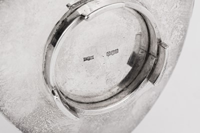 Lot 525 - A pair of Elizabeth II Scottish modernist sterling silver taper stick holders, Edinburgh 1965 by Rosa Edith Morley (reg. Dec 1948)