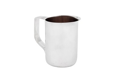 Lot 532 - A heavy Elizabeth II Modernist sterling silver milk jug, London 1970 by John Michael Driver
