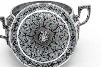 Lot 290 - An early 20th century Iranian (Persian) unmarked silver and champlevé enamel twin handled sugar bowl and cover, Isfahan or Rasht circa 1920-30