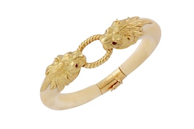 Lot 107 - λ Van Cleef & Arpels | A ruby and ivory bangle, 1974