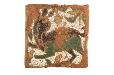 Lot 316 - A CUERDA SECA POTTERY FLOOR TILE WITH A HARE