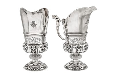 Lot 414 - A pair of early 20th century French 950 standard silver ewers, Paris circa 1920 by Jacques Risler (reg. 19th October 1920, biff. 7th feb 1927)