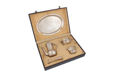 Lot 265 - A cased early 20th century Egyptian 800 standard silver bachelor coffee set and tray, Cairo 1921