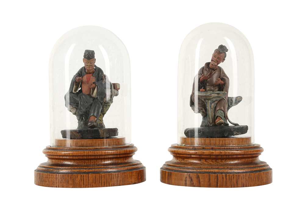 Lot 282 - A PAIR OF CHINESE PAINTED TERRACOTTA NODDING FIGURES.