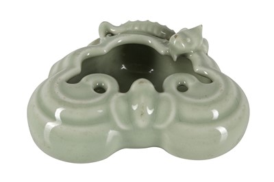 Lot 1036 - A CHINESE CELADON-GLAZED WASHER.