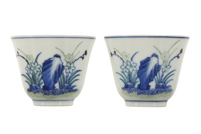 Lot 426 - A PAIR OF CHINESE DOUCAI CUPS.