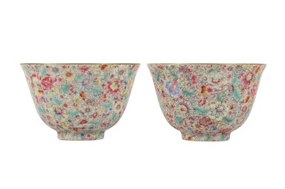 Lot 422 - A PAIR OF CHINESE FAMILLE ROSE 'MILLEFLEUR' CUPS.