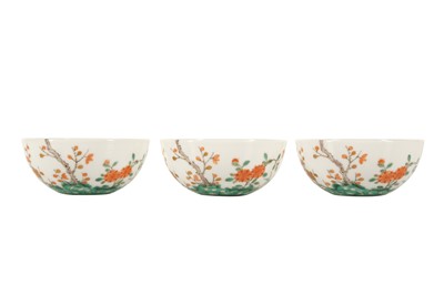 Lot 1008 - A SET OF THREE CHINESE FAMILLE VERTE 'PLUM BLOSSOM' CUPS.