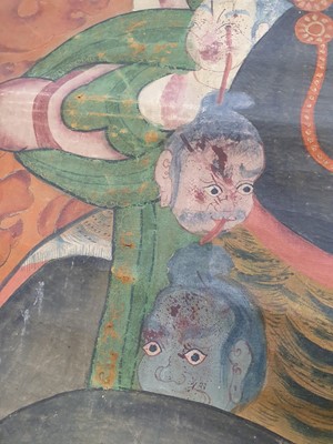 Lot 247 - A LARGE THANGKA OF SIMHAVAKTRA DAIKINI.