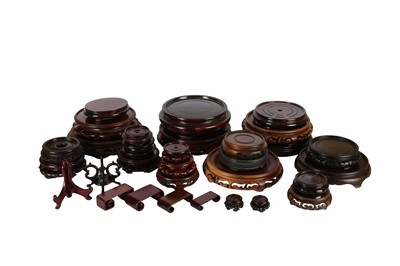 Lot 551 - A COLLECTION OF CHINESE WOOD STANDS.