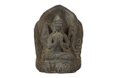 Lot 409 - A SHIST RELIEF OF A FOUR-ARMED BODHISATTVA.