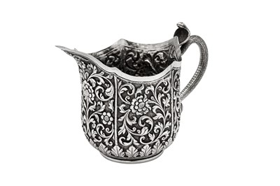 Lot 175 - A late 19th century Anglo – Indian silver milk or cream jug, Cutch, Bhuj circa 1880 by Oomersi Mawji (active 1860-90)