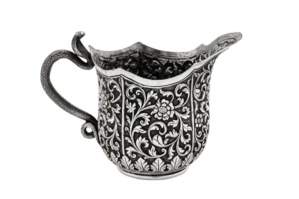 Lot 175 - A late 19th century Anglo – Indian silver milk or cream jug, Cutch, Bhuj circa 1880 by Oomersi Mawji (active 1860-90)