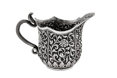 Lot 175 - A late 19th century Anglo – Indian silver milk or cream jug, Cutch, Bhuj circa 1880 by Oomersi Mawji (active 1860-90)