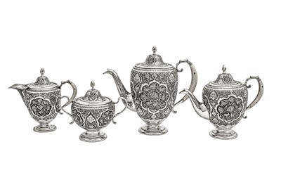 Lot 311 - A mid-20th century Iranian (Persian) silver four-piece tea and coffee service, Isfahan circa 1950 mark of Kazeem