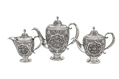 Lot 311 - A mid-20th century Iranian (Persian) silver four-piece tea and coffee service, Isfahan circa 1950 mark of Kazeem