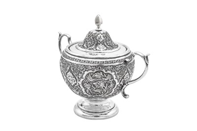 Lot 311 - A mid-20th century Iranian (Persian) silver four-piece tea and coffee service, Isfahan circa 1950 mark of Kazeem