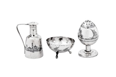 Lot 341 - A mixed group of early to mid-20th century Iraqi silver and niello cruets