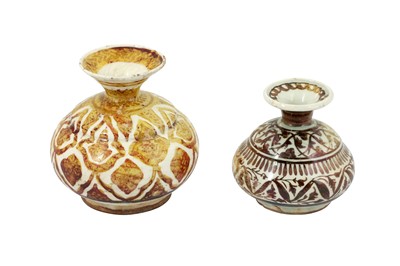 Lot 106 - TWO SAFAVID COPPER LUSTRE-PAINTED POTTERY BOTTLES