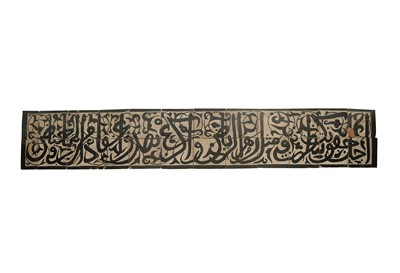 Lot 531 - A MARINID-REVIVAL BLACK CALLIGRAPHIC POTTERY FRIEZE