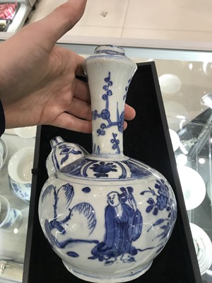 Lot 567 - A CHINESE BLUE AND WHITE KENDI.