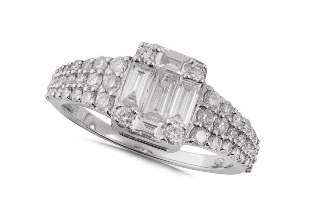 Lot 69 - A diamond dress ring